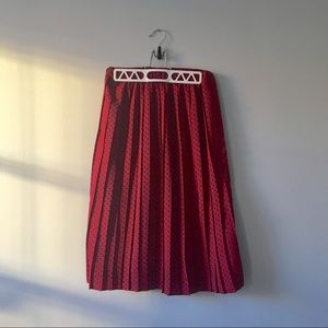 Anthropologie pleaded skirt. Red w/ navy polka dot